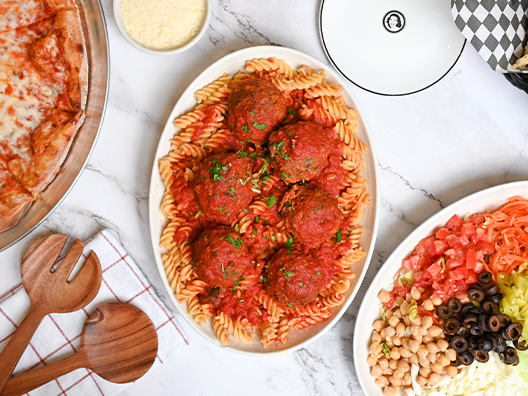 birds eye view of pasta meatballs family meal