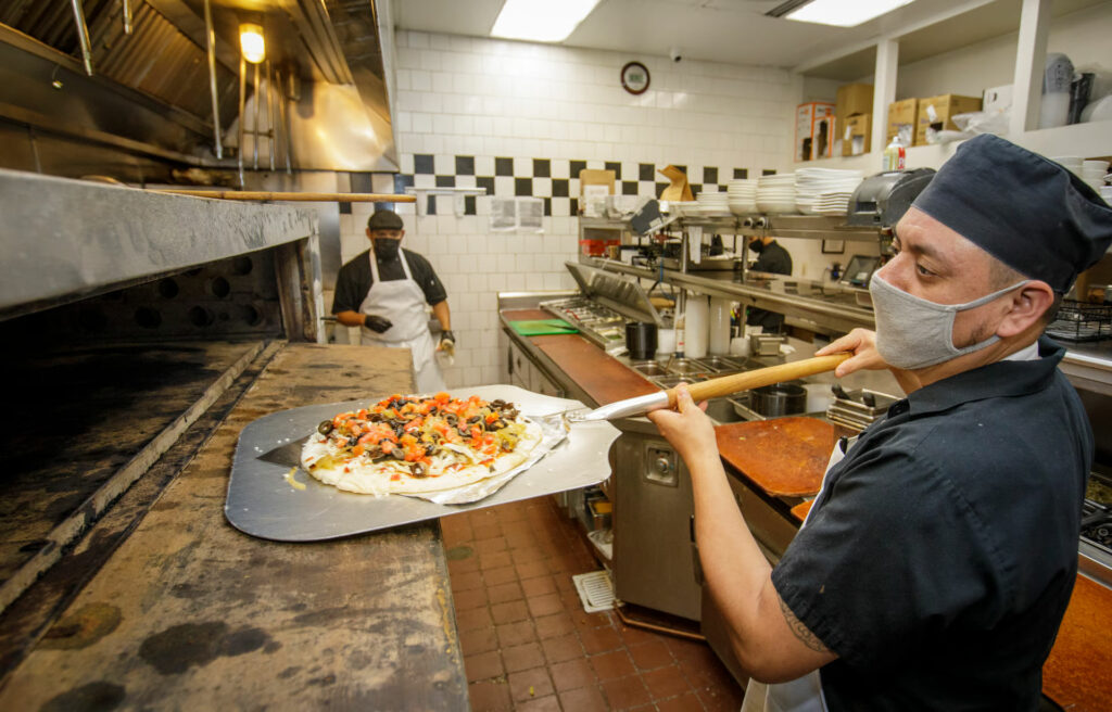 chef making pizza in agoura hills kitchen