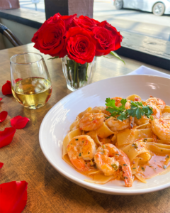 Shrimp pasta with white wine and roses