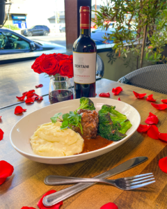 Short rib with a bottle of wine