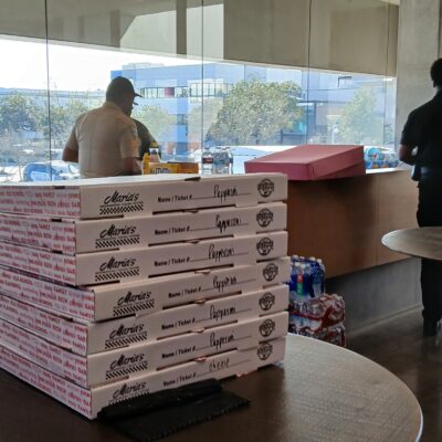 Fresh pizzas boxed and waiting to feed our first responders